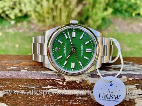 rolex oyster perpetual 126000 - green dial.|rolex oyster perpetual 41mm 124300.